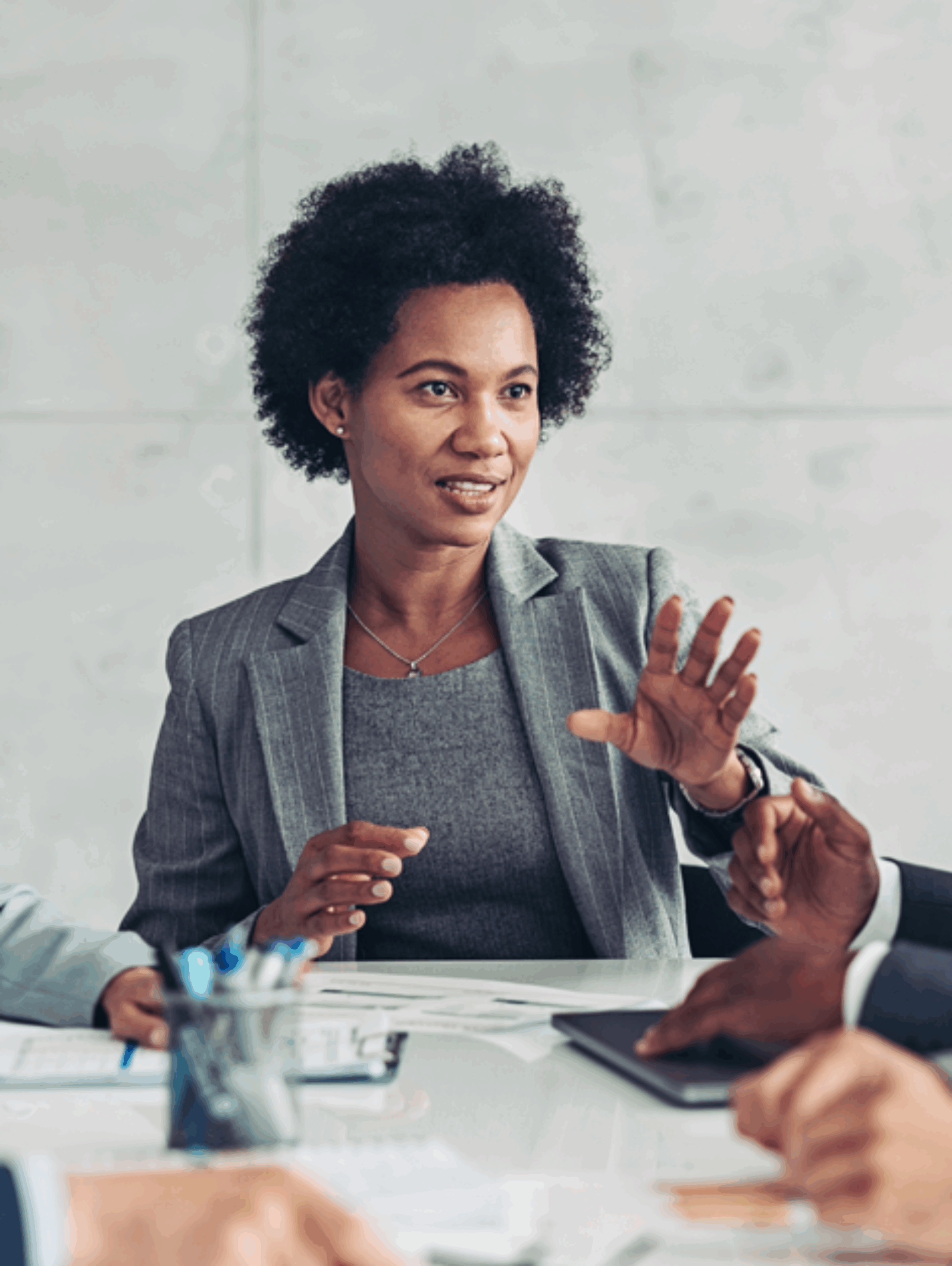 Employees of a finance company at a board meeting